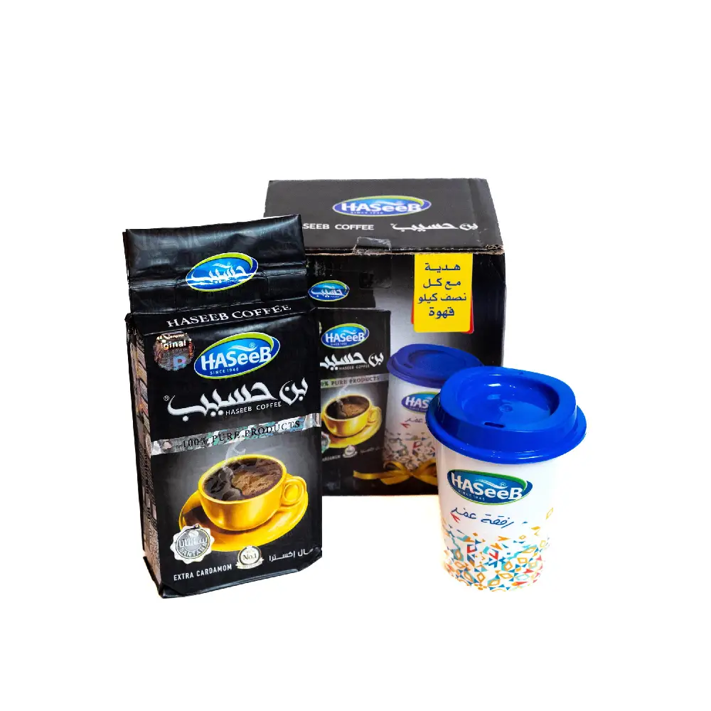 Package of Haseeb Cardamom Coffee 500g with a complimentary glass.